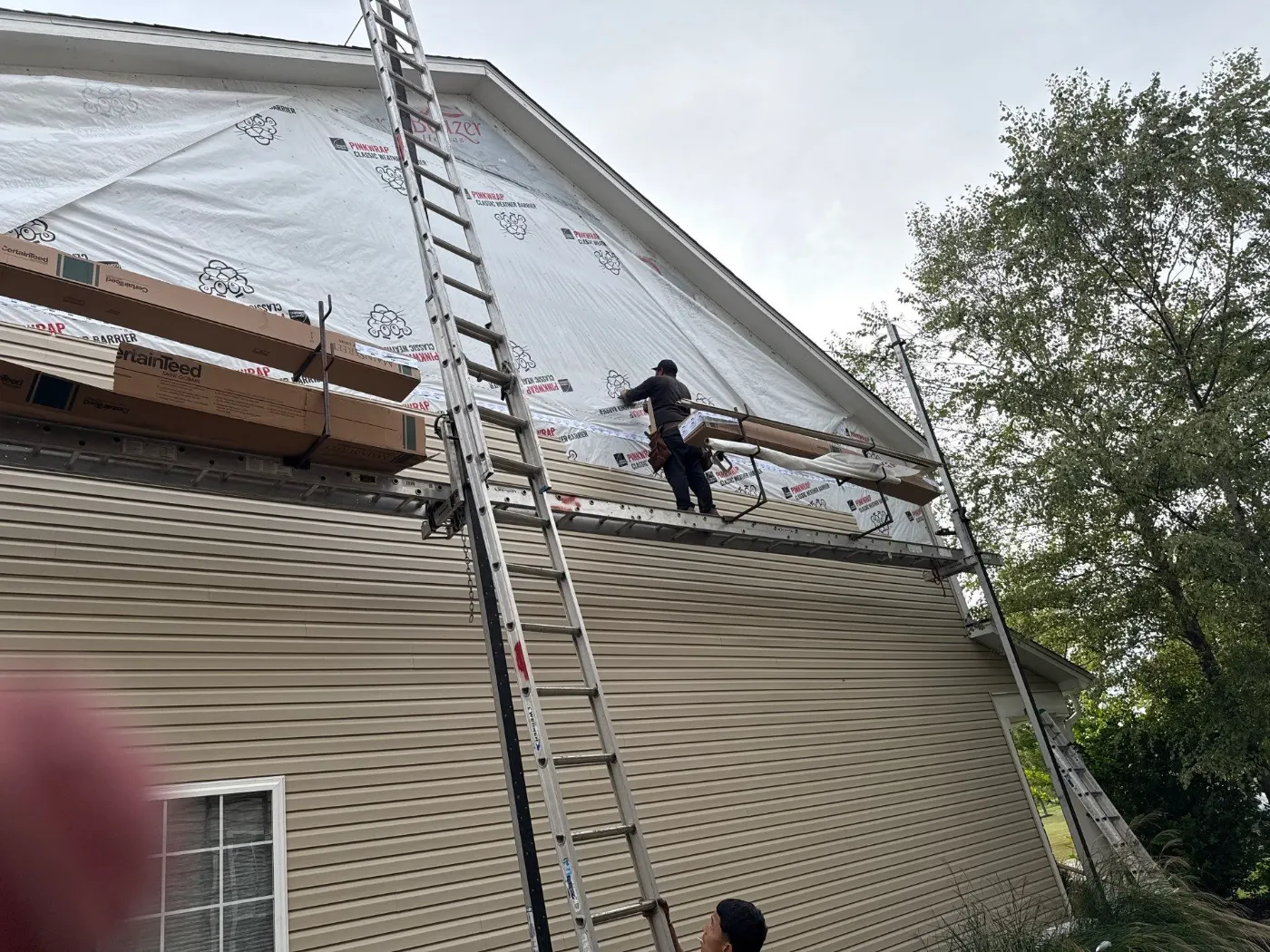 Tarping and dry-in on a Mount Comfort commercial roof